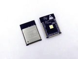 ESP32 ESP-wroom-32 - shown from the front with a metal shield and from the back displaying the printed pinout labels on a black circuit board.