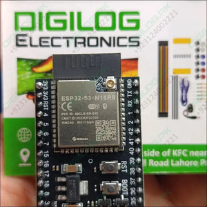 ESP32-S3 Devkitc-1 N16R8 Development Board – 16MB Flash, 8MB Psram, Wi-Fi & Bluetooth 5.0 Le With External Antenna Connector - a black PCB with a metal shield, two buttons labeled RST and BOOT, and header pins, with accessories nearby.