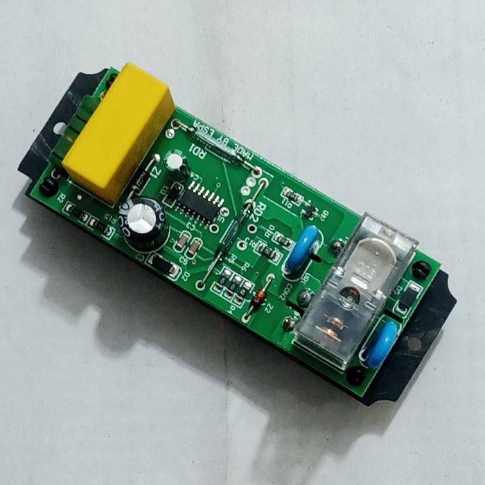 Espa Pressure Controller Circuit - Card - a green rectangular printed circuit board featuring a yellow transformer, a relay, and various electronic components.