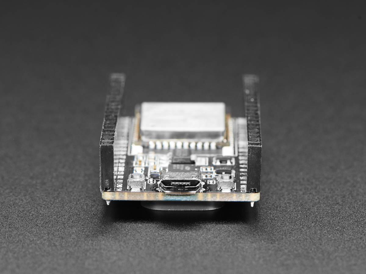 Espressif ESP32 Wroom 32D Development Board - shown from the front, featuring a micro-USB port, two push buttons, and black header pins on a black board.