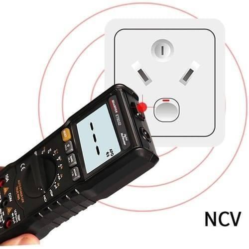 ET8102 True RMS Digital Display Pocket Size Multimeter 1000V 10A Voltmeter Ammeter - shown in black, displaying three dashes on its screen while being used for NCV detection near a wall power outlet.