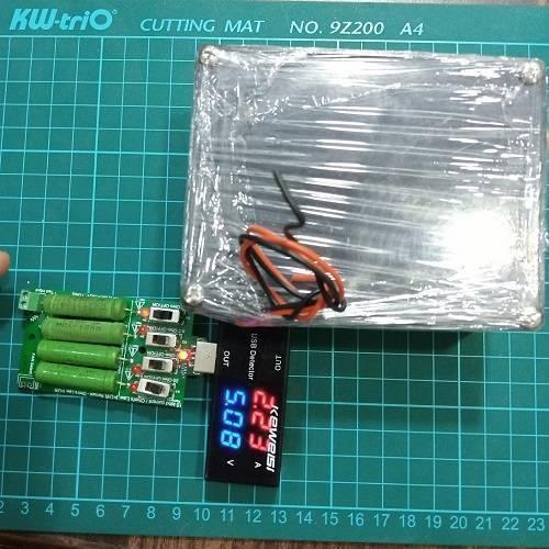 Euler | Raspberry Pi UPS 5V Battery Backup - shown with a green circuit board, four resistors, toggle switches, and a USB detector displaying 5.08V and 2.23A.