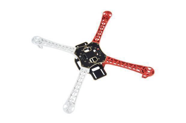 F450 Drone Kit DIY Quadcopter Flying Multicopter Heli Flame Wheel Kit - a central black frame plate with two white arms and two red arms extending outward.
