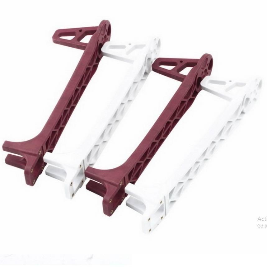 F450 Drone Kit DIY Quadcopter Flying Multicopter Heli Flame Wheel Kit - four drone frame arms in alternating white and maroon colours arranged in a row.
