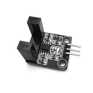 Fc-33 10mm Arduino RPM Sensor Rotational Speed Measuring Sensor - a black U-shaped optical sensor module with three metal pins and two mounting holes on a printed circuit board.