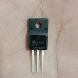 FFPF20UA60DN 600V 20A Ultrafast Dual Diode - a black, three-pin electronic component with a mounting hole, held against a person's palm.