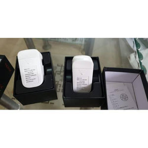 Finger Pulse Digital Oximeter-SPO2 - shown in two white units placed inside their individual black retail boxes, with one box containing a manual.