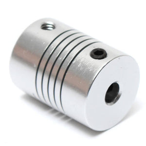 Flexible Coupling Shaft 4MMX5MM - a cylindrical silver metal coupling with a spiral flex section and two black hex set screws.