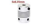 Flexible Coupling Shaft 5MMX6.35mm - a silver cylindrical metal connector with a spiral-cut flexible center and four black set screws.