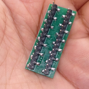 For Solar Inverter Inverter IC DSPIC30F2010 - a close-up view of a green rectangular circuit board featuring two parallel rows of black pin headers.