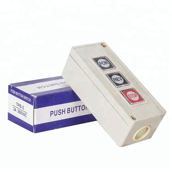 Forward Reverse Stop Momentary Push Button Switch TPB3 - shown as a beige rectangular control unit with three buttons next to its blue and white box.