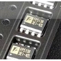 FP5138 Boost Controller SMD IC - close-up view of two black surface-mount integrated circuit chips with white text markings, packaged in a plastic tray.
