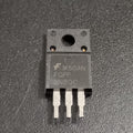 FQPF8N80C 800V 8A N-Channel Power MOSFET (TO-220F) used - a black, three-pin electronic component in a TO-220F package, shown in a top-down close-up view against a dark textured background.