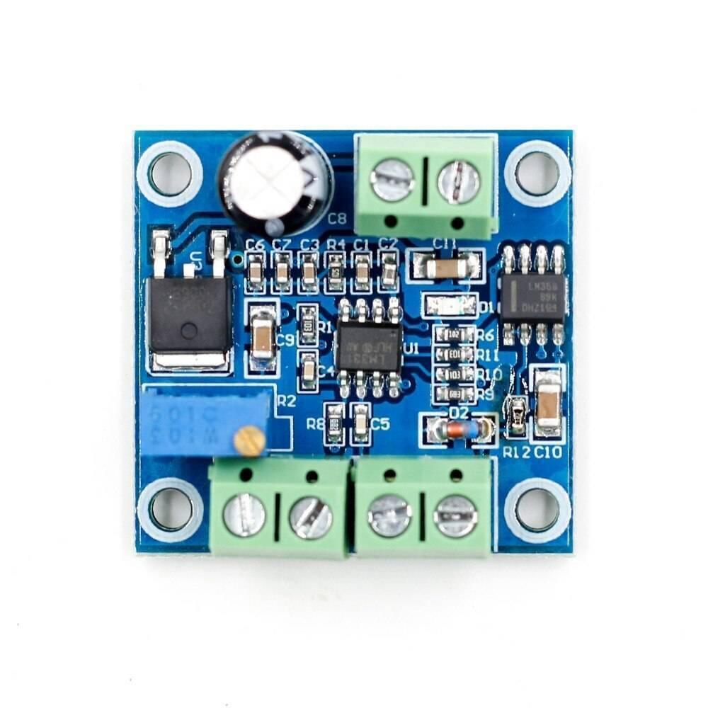 Frequency To Voltage Converter Module 0-1kHz To 0-10V Digital To Analog Voltage Signal Conversion Module - a blue rectangular circuit board with two screw terminal blocks, an adjustable potentiometer, and integrated chips.