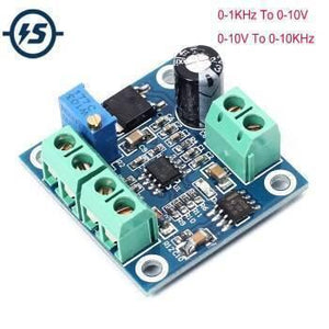 Frequency To Voltage Converter Module 0-1kHz To 0-10V Digital To Analog Voltage Signal Conversion Module - a blue circuit board with a blue potentiometer, two green terminal blocks, a black capacitor, and two ICs.