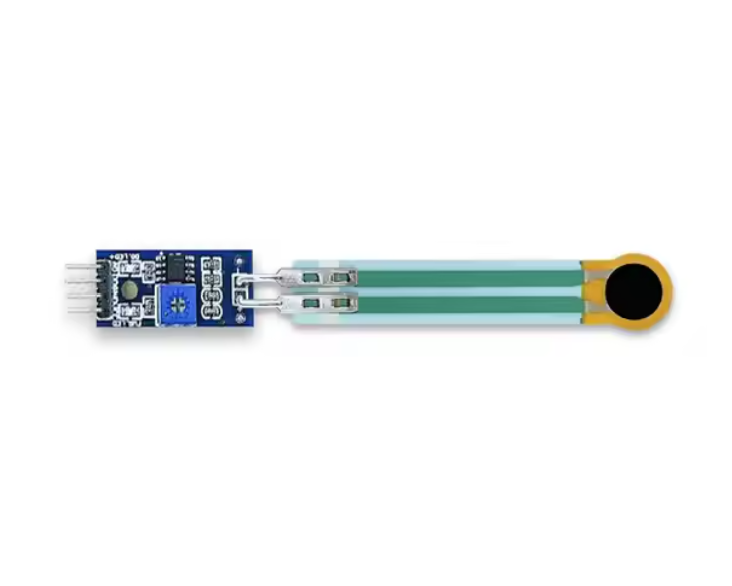 Fsr Single Zone Sensor RP-C7.6lt-LF2 | Thin Film Pressure Sensor - Digilog.pk - a thin film pressure sensor with a circular tip, flat green ribbon cable, and a blue circuit board with four pins.