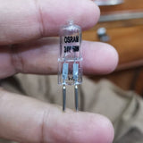 G5.3 24V 50W Halogen Light Bulbs Long Life Capsule Lamps Warm White Clear Bulbs - a close-up of a clear capsule lamp with two metal pins, showing the Osram brand and 24V 50W text on the glass.