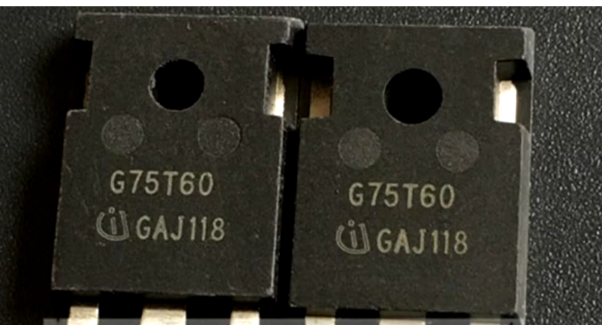 G75T60 IGBT Power Transistor - a close-up of two black, rectangular electronic components with G75T60 and GAJ118 printed on their surfaces.
