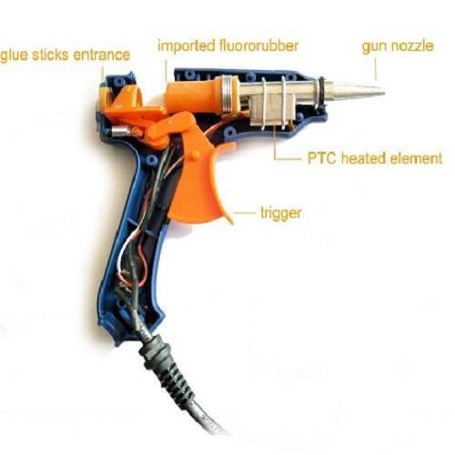 Glue Gun For 11mm Glue Sticks 80W 50/60Hz - shown with its blue plastic casing open to reveal the internal trigger, nozzle, and heating element components.