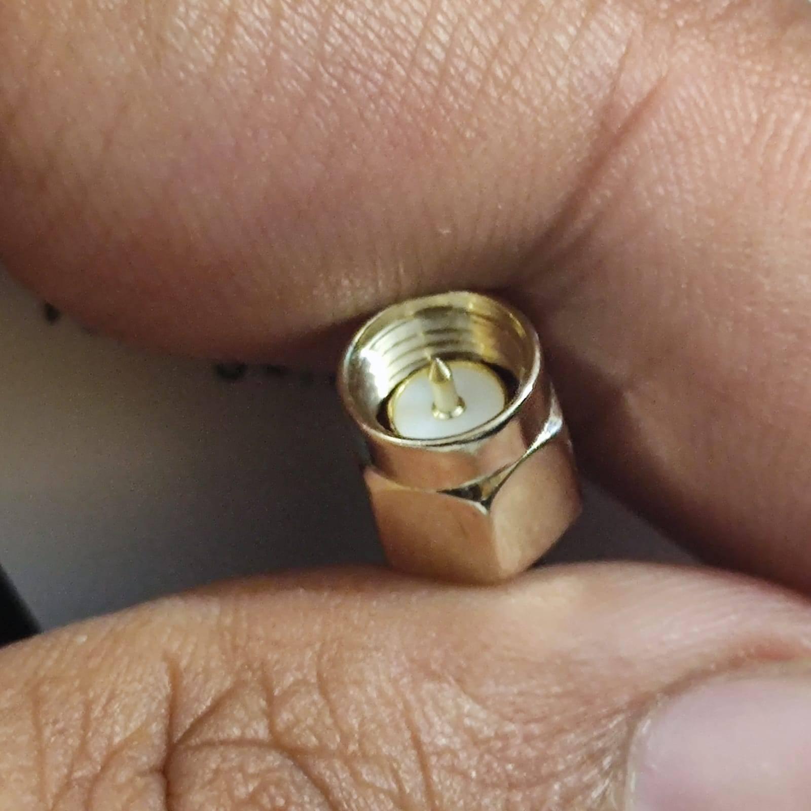 GPS Antenna External Active Antenna For GPS – 3-5V 28DB - a close-up view of the gold-coloured SMA male connector with a central pin.