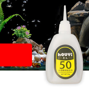 Gr 50G Fast-drying Glue Strong Adhesive Safe Non-toxic Glue Aquarium Landscape Supplies - a white plastic squeeze bottle with a pointed nozzle and a black and yellow label reading "houyi 50" and "AQUASCAPE ADHESIVE".