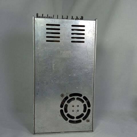 Great Well 5V 55A Power Supply - shown from the back, featuring a metallic rectangular casing with ventilation slots and a circular cooling fan.