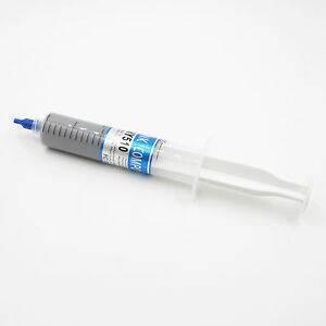 Grey White Heat Sink Thermal Grease Paste HY510-TU20 For CPU VGA LED Chip Set - shown in a clear plastic syringe with a blue cap against a white background.