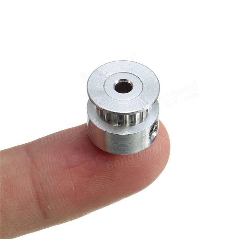 GT2 Pulley 16 Teeth Bore 5mm Timing Gear Alumium For GT2 Belt Width 13mm 3d Printer Accessories - a close-up of a silver aluminum timing gear with a central bore hole being held on a finger.