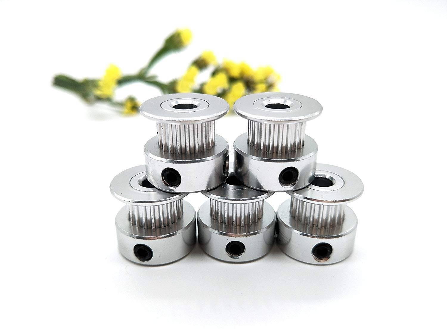 GT2 Pulley 16 Teeth Bore 5mm Timing Gear Alumium For GT2 Belt Width 13mm 3d Printer Accessories - five silver aluminum timing gears with set screws arranged in a stack, with yellow flowers in the blurred background.
