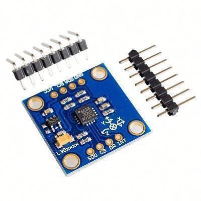 Gy-50 L3G4200D Three-axis Digital Gyro Sensor Module Angular Velocity Module - a blue circuit board with a central chip, pin headers, and labeled connection ports.
