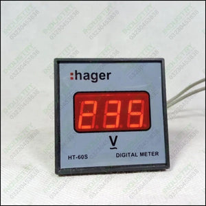 Hager HT-60S Digital Meter - a square black panel-mount device with a red three-digit LED display showing a voltage symbol and grey wires.