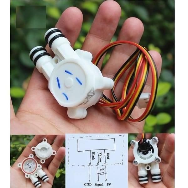Hall Effect Water Flow Sensor Valve Switch - shown in a hand, featuring a white plastic body with two ports, a three-wire cable, and a wiring diagram.