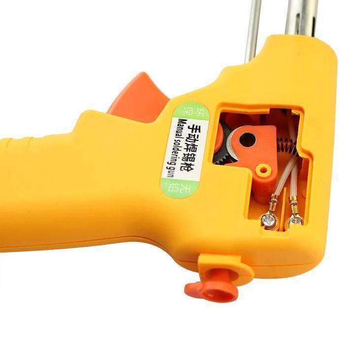 Hand-held Heating Soldering Iron 110V / 220V 60W / 80W mannual Soldering gun - a yellow pistol-grip tool with an exposed internal mechanism, a trigger, and a label reading "Manual soldering gun".