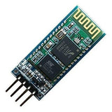 HC06 Bluetooth Module - a rectangular green circuit board with two black integrated circuit chips, a gold antenna pattern, and four metal header pins.
