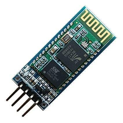 HC06 Bluetooth Module - a rectangular green circuit board with two black integrated circuit chips, a gold antenna pattern, and four metal header pins.