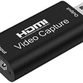 HDMI To USB 2.0 Converter HDMI Video Capture Card For Windows Android Macos - a black rectangular device featuring an HDMI input port on one end and a USB output connector.