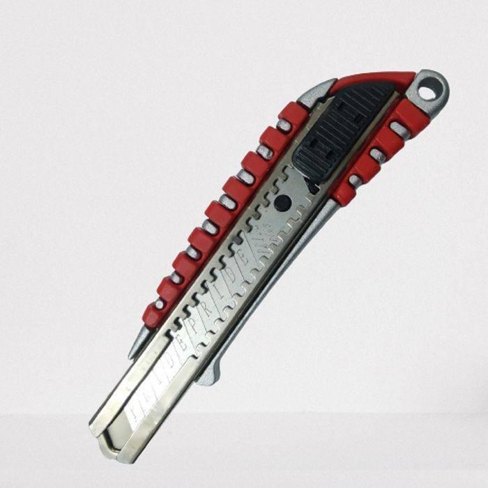 Heavy Duty Knife 24mm Alloy Steel Blade Cutter - a silver metal body with a red rubberized grip and a black sliding blade lock mechanism.