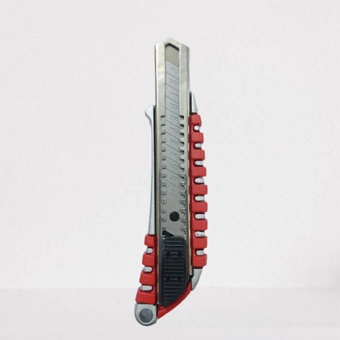 Heavy Duty Knife 24mm Alloy Steel Blade Cutter - shown in a side profile view with a silver metal body and red rubberized grip accents.