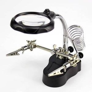 Helping Hand Clip Desktop LED Light Magnifier Glass With Soldering Stand 3.5x 12x - a black base, two adjustable metal clips, and a magnifying lens.