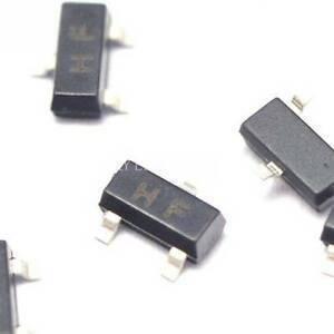 Hf SMD NPN, 15V, 0,1A, 0,5W, Sot-23 - a close-up shot of several small black SOT-23 surface-mount components with the letters "HF" printed on their top surfaces.