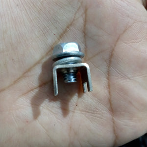 High Current Screw Terminal Connector - a close-up showing a silver metal U-shaped bracket with a bolt, washer, and nut held in a palm.