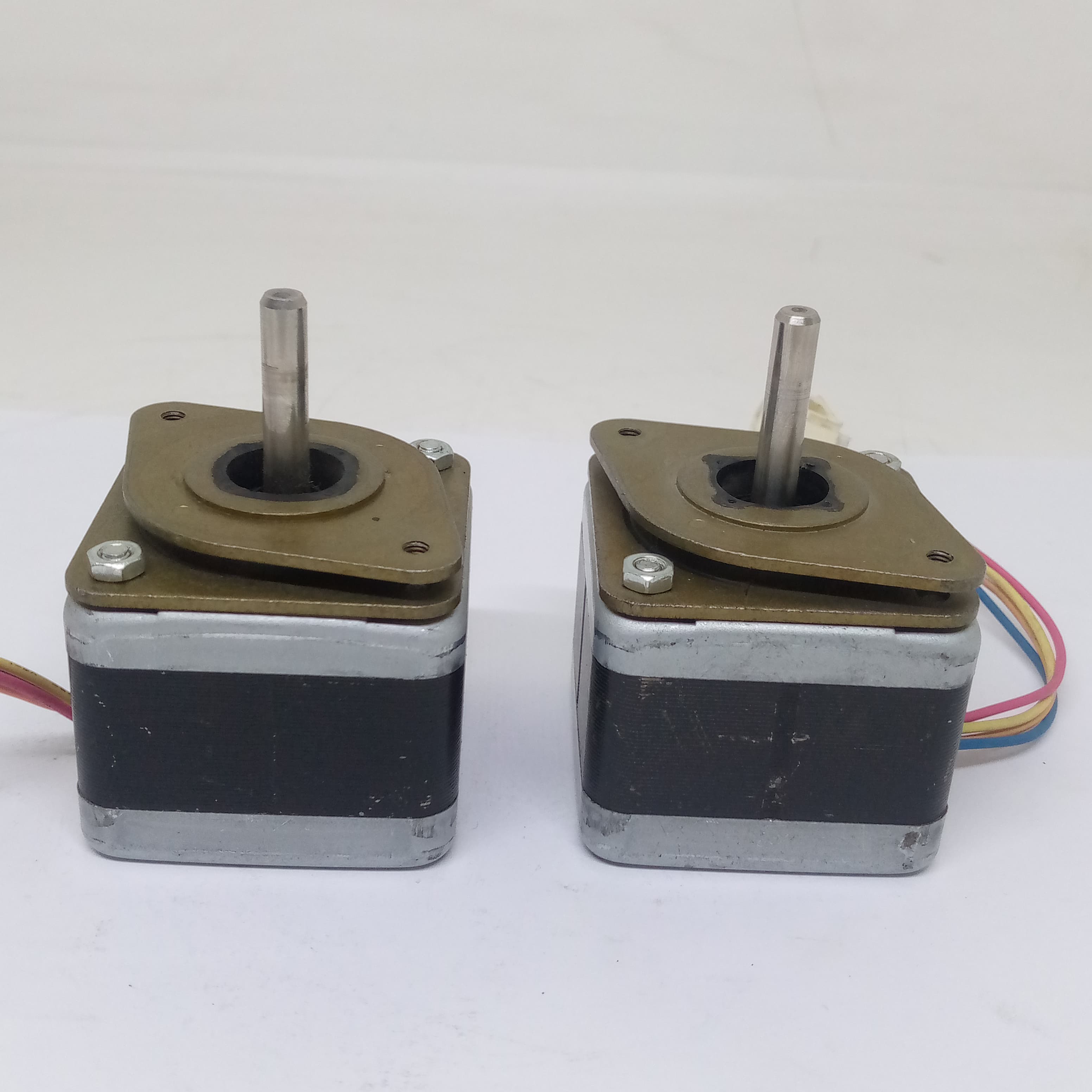 High-precision Stepper Motor NEMA17 5 To 24V DC For Precise Positioning Applications - with metal shafts and multi-coloured wire leads.