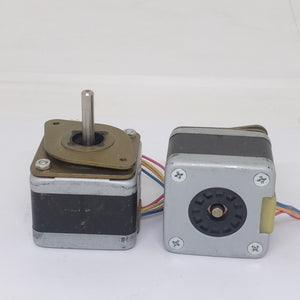 High-precision Stepper Motor NEMA17 5 To 24V DC For Precise Positioning Applications - with shafts and multi-colored wire connectors.