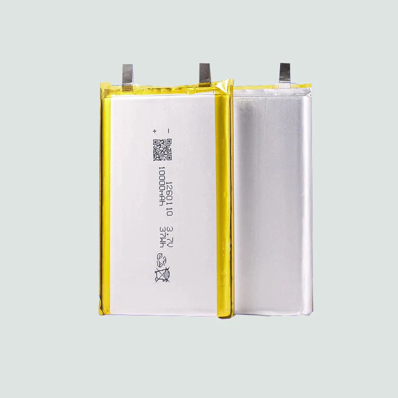 High Quality 3.7V 10000mAh 1260110 Polymer Lithium Ion Li-ion Rechargeable Battery For Toy Power Bank GPS Table E-book Batteries - two rectangular silver battery cells with metal tabs and printed text including 10000mAh 3.7V.