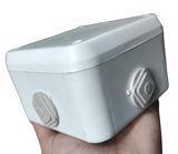 High Quality ABS Plastic Junction Box Universal Electrical Project Enclosure 100x100x65mm - a white square plastic box held in a hand.