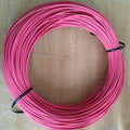 High quality Red wire 1 meter - shown as a coiled length of red electrical wire secured by two black cable ties on a wooden surface.