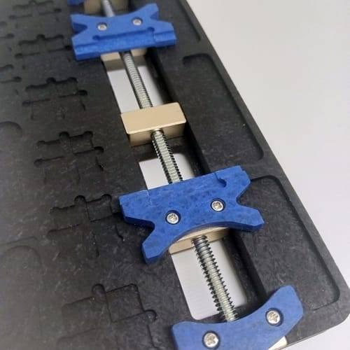 High Temperature PCB Board Holder Maintenance Repair Fixture Stand For Mobile Phone SMT Soldering Iron - a black base with adjustable blue clamps mounted on a threaded metal rod.