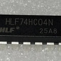 HLF74HC04N Hex Inverter IC DIP-14 - a black, rectangular 14-pin integrated circuit with the text "HLF74HC04N" and "25A8" printed on its top surface.