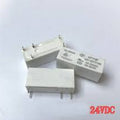 Hongfa PCB Power Relay 24VDC 10A 1co HF118F/024-1ZS1T(136) - three rectangular white electronic relays with metal pins on a white background.