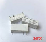 Hongfa PCB Power Relay 24VDC 10A 1co HF118F/024-1ZS1T(136) - three rectangular white electronic relays with metal pins on a white background.